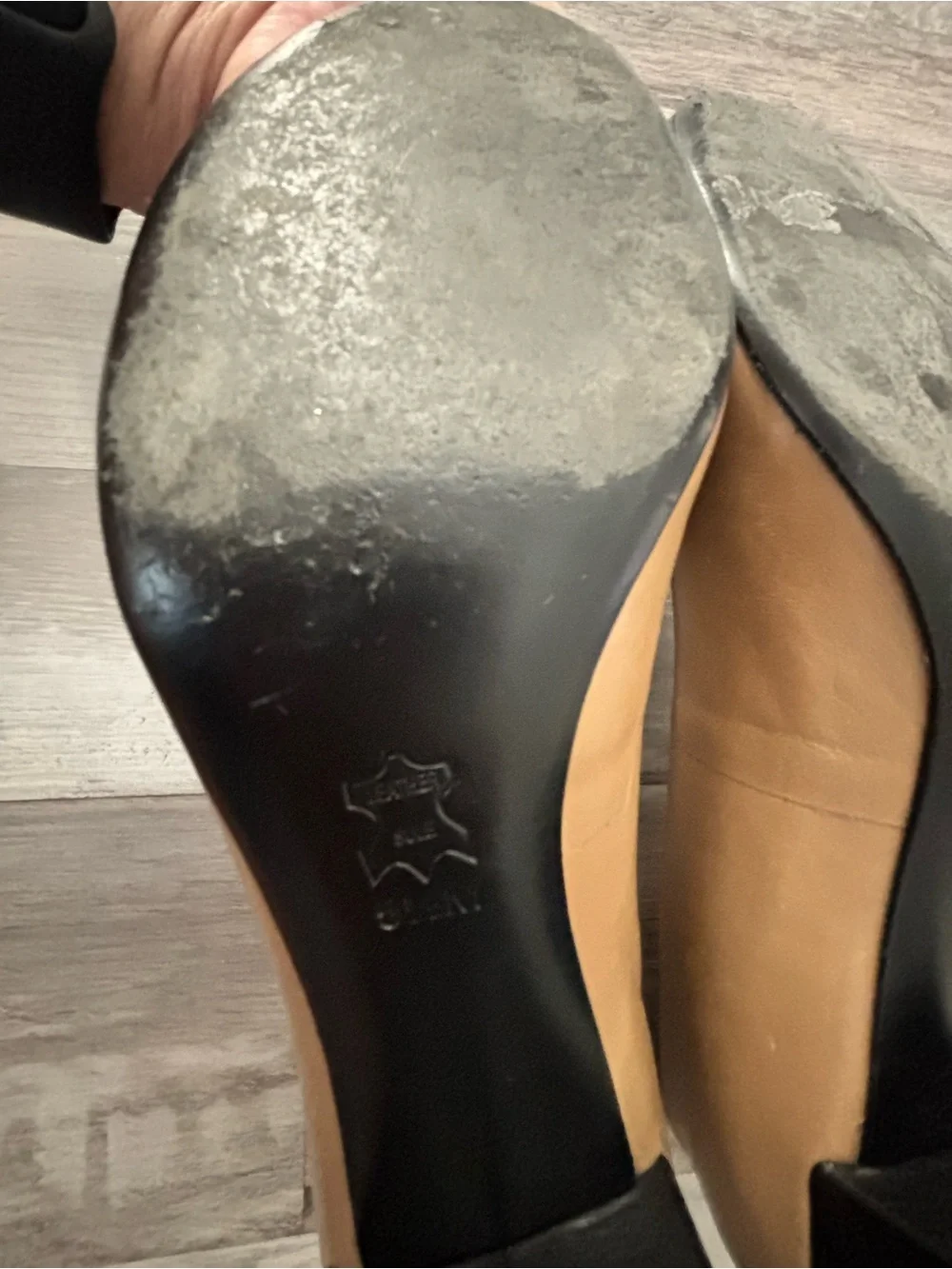 Tory Burch Two-Tone Tan and Black Cap-Toe Pumps with Gold Logo